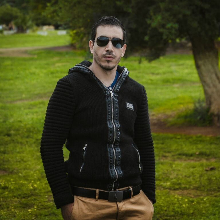 Atef Khelili wearing a black jacket.